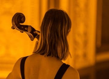 Candlelight: Queen Vs. Abba at Calgary Central Library